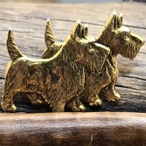 Scottie Dog Brooch Molded Gold Tone Thin Metal Vintage Measures 1½" X 1"